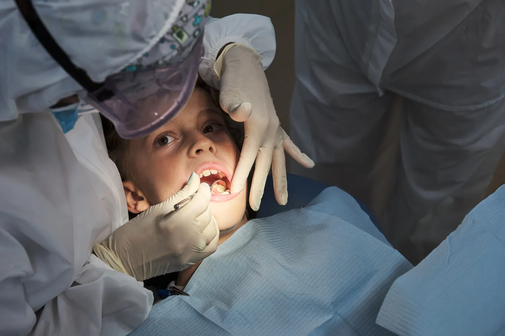 A kid having a dental check-up